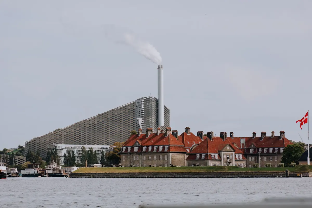 CopenHill waste-to-energy plant with Danish architecture along Copenhagen's waterfront.